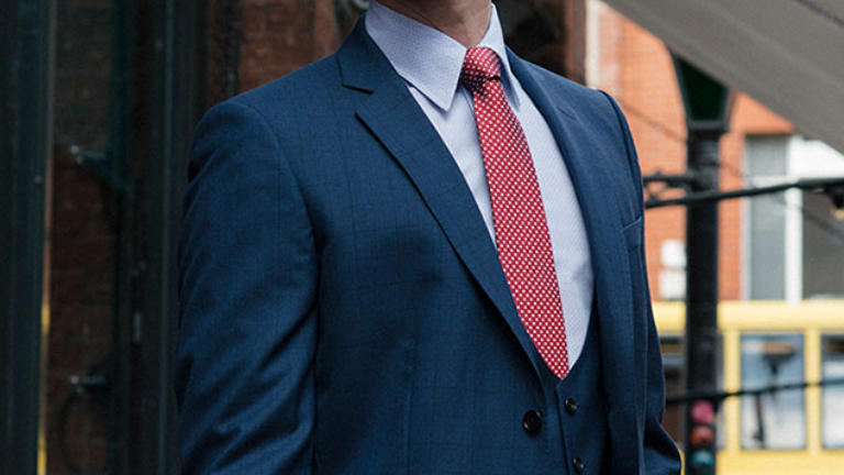 Casual blue suit with pink tie